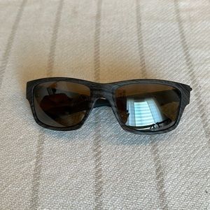 Men’s Oakley polarized sunglasses.